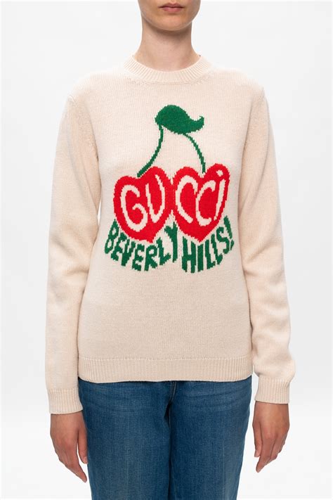 gucci sweater with gucci on it